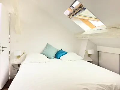 Un ou plusieurs lits dans un hébergement de l'établissement Penbed - Place Vendome - 1BR