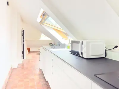 Cuisine ou kitchenette dans l'établissement Penbed - Place Vendome - 1BR