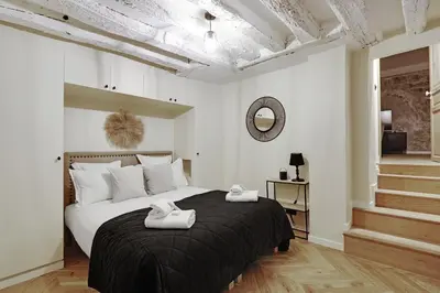 Un ou plusieurs lits dans un hébergement de l'établissement Test Apartment in GUESTY - TEST