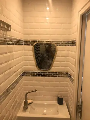 Salle de bains dans l'établissement Eclat de Verrerie 4P Paris Gestion Immo Daumesnil