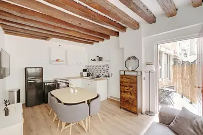 Cuisine ou kitchenette dans l'établissement Marais-Montorgueil - Cozy Apartment - 2BR-8P