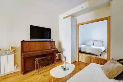 Un ou plusieurs lits dans un hébergement de l'établissement Appartement cosy - Eiffel Tower