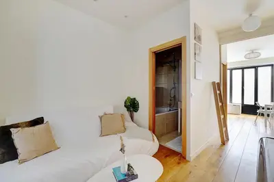 Un ou plusieurs lits dans un hébergement de l'établissement Appartement cosy - Eiffel Tower