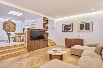 Télévision ou salle de divertissement dans l'établissement Modern Apartment 2 bedrooms Center of Paris