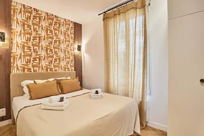Un ou plusieurs lits dans un hébergement de l'établissement Modern Apartment 2 bedrooms Center of Paris