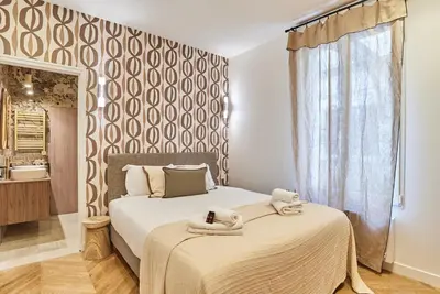 Un ou plusieurs lits dans un hébergement de l'établissement Modern Apartment 2 bedrooms Center of Paris