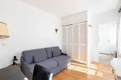 Coin salon dans l'établissement GuestReady - Charming Marais midterm stay