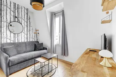 Coin salon dans l'établissement BM- Petit Nid Cosy a Montparnasse - Studio equipe