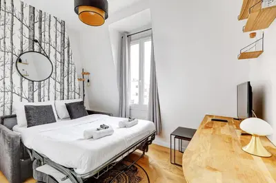 Coin salon dans l'établissement BM- Petit Nid Cosy a Montparnasse - Studio equipe