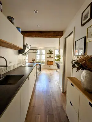 Cuisine ou kitchenette dans l'établissement Elegant apartment in Montorgueil