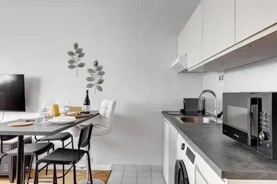 Cuisine ou kitchenette dans l'établissement 506 Suite Alisée - Charming apartment in Boulogne