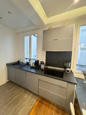 Cuisine ou kitchenette dans l'établissement Celine 27 Le reflet du Rocher, Appart à deux pas de l'Arc