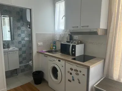 Cuisine ou kitchenette dans l'établissement Studio 800m to Opéra