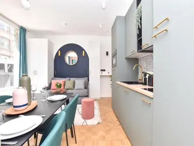 Cuisine ou kitchenette dans l'établissement Charming and cosy flat next to the Eiffel Tower