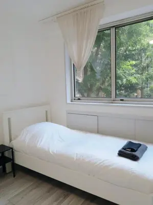 Un ou plusieurs lits dans un hébergement de l'établissement Opéra de Paris-6 Min Walk-Modern Apt 4 sleepe