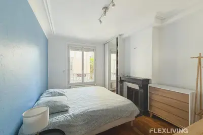 Un ou plusieurs lits dans un hébergement de l'établissement Charming 2-Bedroom Apartment in Paris 5