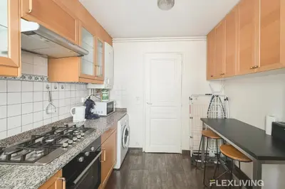 Cuisine ou kitchenette dans l'établissement Charming 2-Bedroom Apartment in Paris 5