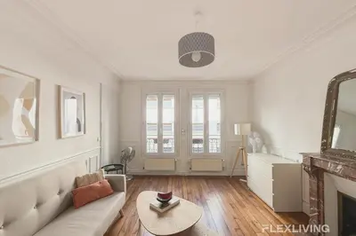 Coin salon dans l'établissement Charming Room in shared 2-Bedroom Apartment in Paris 5