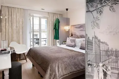 Un ou plusieurs lits dans un hébergement de l'établissement Hotel Monsieur & Spa