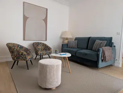 Coin salon dans l'établissement Appartement Paris Champs-Elysées