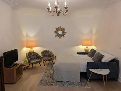 Coin salon dans l'établissement Appartement Paris Champs-Elysées