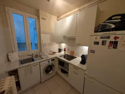 Cuisine ou kitchenette dans l'établissement Appartement Paris Champs-Elysées