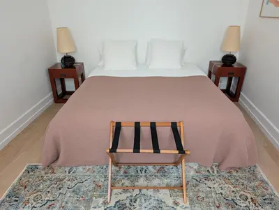 Un ou plusieurs lits dans un hébergement de l'établissement Appartement Paris Champs-Elysées