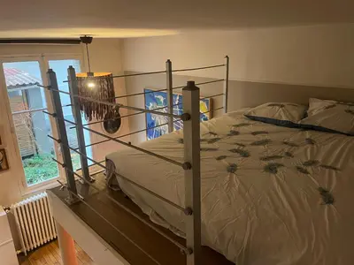 Un ou plusieurs lits dans un hébergement de l'établissement Cosy Canal St Martin