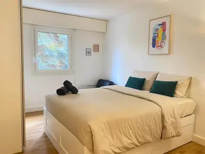Un ou plusieurs lits dans un hébergement de l'établissement Appartement Beaugrenelle Ginoux Paris