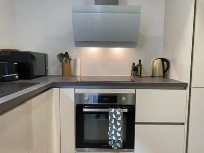 Cuisine ou kitchenette dans l'établissement Appartement Beaugrenelle Ginoux Paris