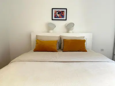 Un ou plusieurs lits dans un hébergement de l'établissement Appartement Beaugrenelle Ginoux Paris