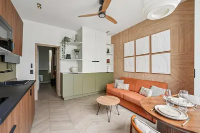 Cuisine ou kitchenette dans l'établissement Comfortable 1-bedroom 4P apartment - Voltaire