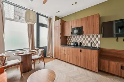 Cuisine ou kitchenette dans l'établissement Comfortable 1-bedroom 4P apartment - Voltaire