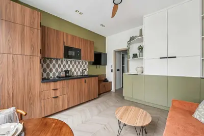 Cuisine ou kitchenette dans l'établissement Comfortable 1-bedroom 4P apartment - Voltaire