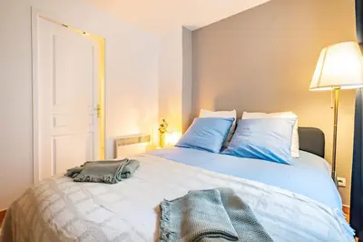 Un ou plusieurs lits dans un hébergement de l'établissement 4 Guests Flat - Place Monge