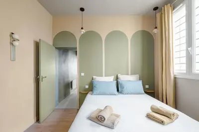 Un ou plusieurs lits dans un hébergement de l'établissement Loft design with sauna and home cinema