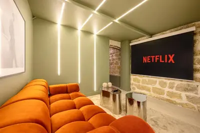 Coin salon dans l'établissement Loft design with sauna and home cinema
