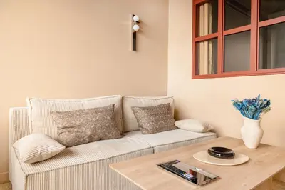 Coin salon dans l'établissement Loft design with sauna and home cinema