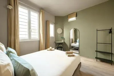 Un ou plusieurs lits dans un hébergement de l'établissement Loft design with sauna and home cinema