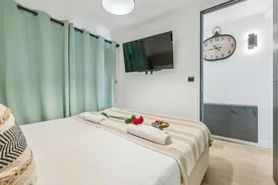 Un ou plusieurs lits dans un hébergement de l'établissement Lavie Maison jacuzzi Saint Germain