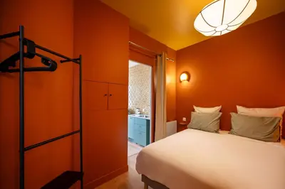 Un ou plusieurs lits dans un hébergement de l'établissement Loft design and cosy, Montparnasse