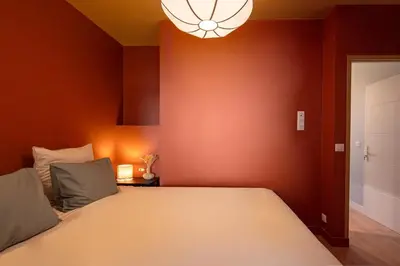 Un ou plusieurs lits dans un hébergement de l'établissement Loft design and cosy, Montparnasse