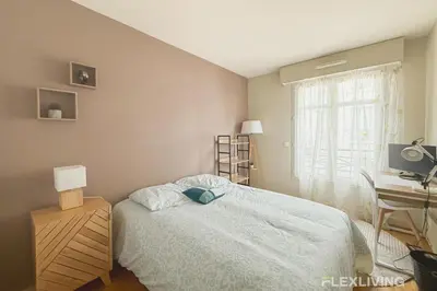 Un ou plusieurs lits dans un hébergement de l'établissement Charming 45m two-bedroom apartment in Paris 15