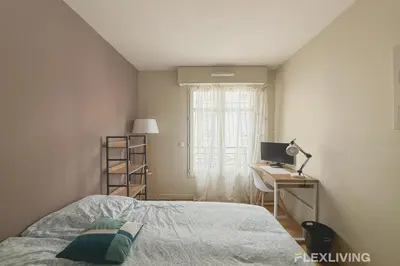 Un ou plusieurs lits dans un hébergement de l'établissement Charming 45m two-bedroom apartment in Paris 15