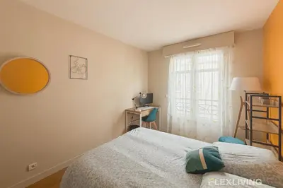 Un ou plusieurs lits dans un hébergement de l'établissement Charming 45m two-bedroom apartment in Paris 15