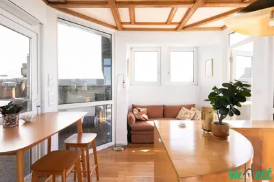Coin salon dans l'établissement Raspail 6 - LB - Studio with Eiffel Tower view in heart of 7e arrondissement