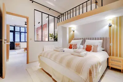 Un ou plusieurs lits dans un hébergement de l'établissement Modern flat - 2 bedrooms 7 people - Montmartre