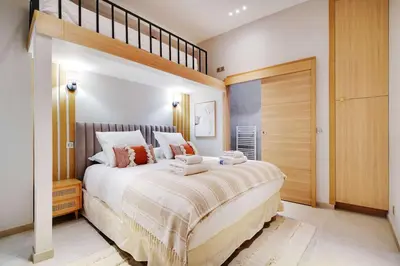 Un ou plusieurs lits dans un hébergement de l'établissement Modern flat - 2 bedrooms 7 people - Montmartre