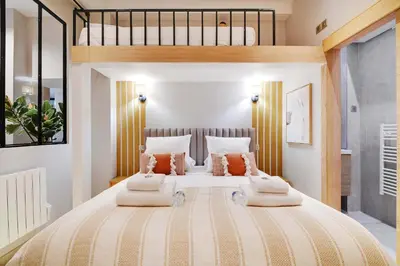Un ou plusieurs lits dans un hébergement de l'établissement Modern flat - 2 bedrooms 7 people - Montmartre