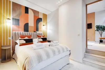 Un ou plusieurs lits dans un hébergement de l'établissement Modern flat - 2 bedrooms 7 people - Montmartre